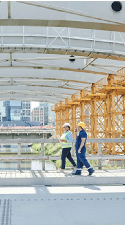 Project manager and client conducting final inspection of completed construction